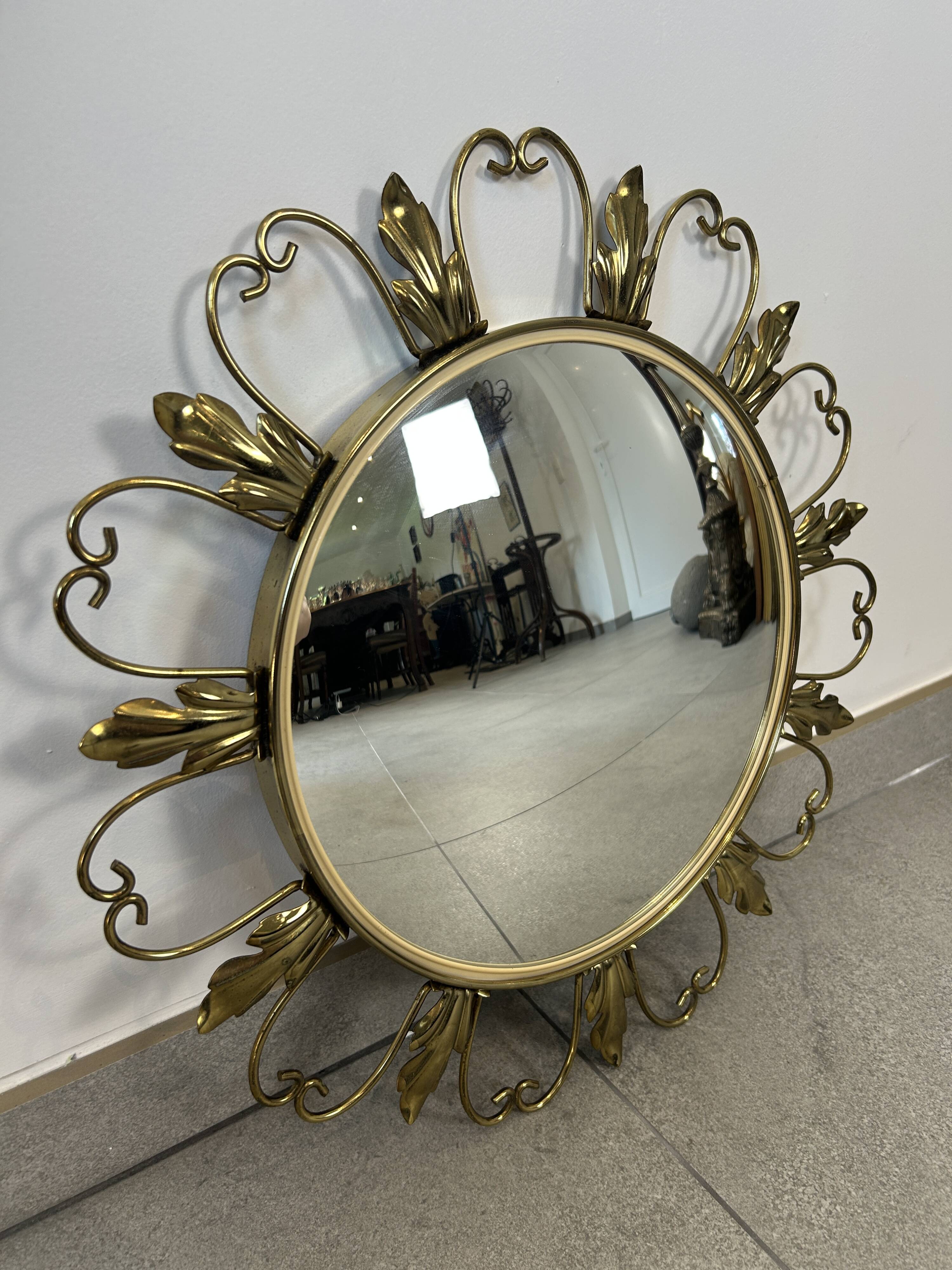 Golden metal convex sun mirror