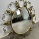 Golden metal convex sun mirror
