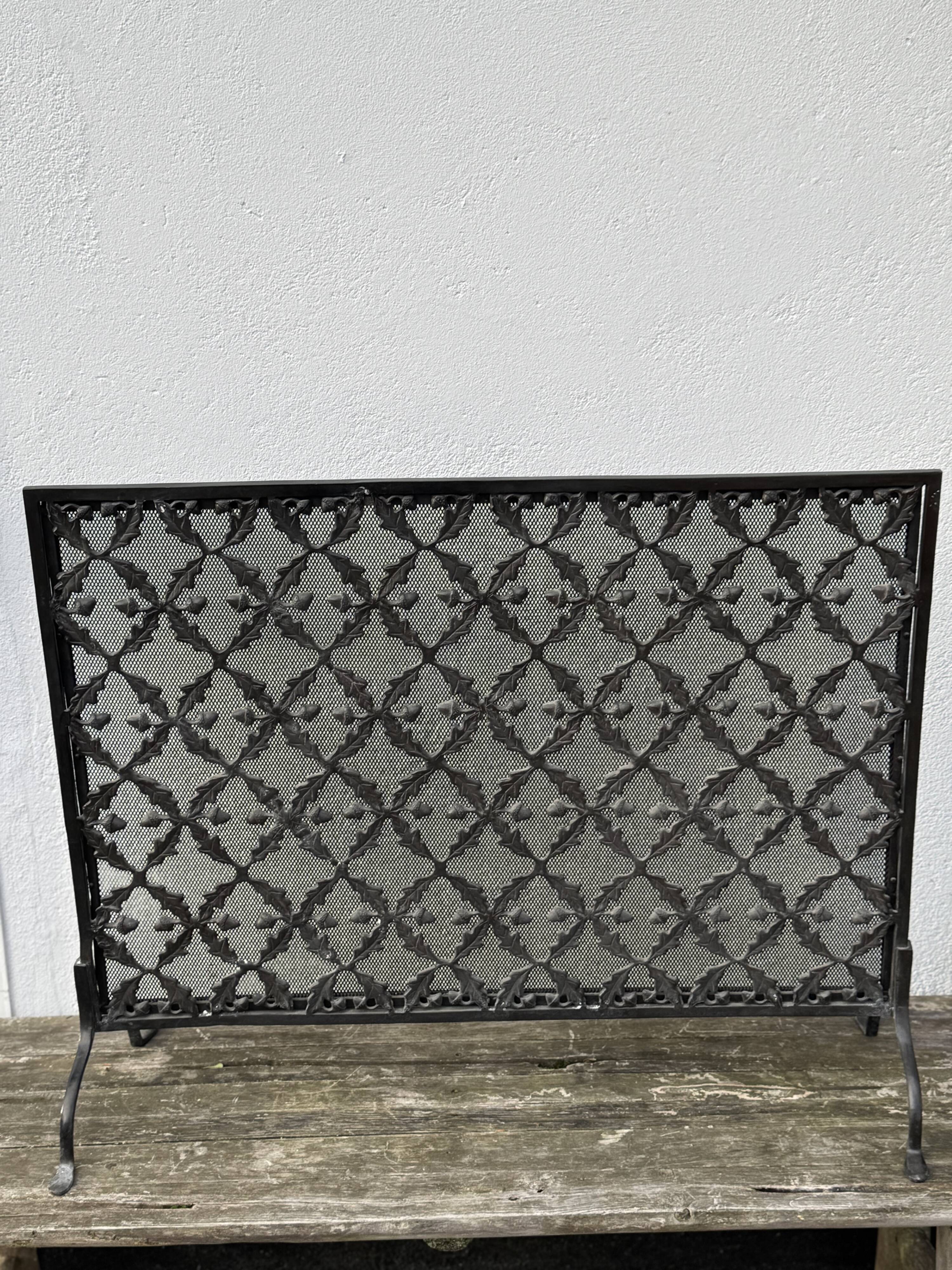 Wrought iron fire screen, France