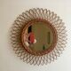 Vintage rattan sun mirror