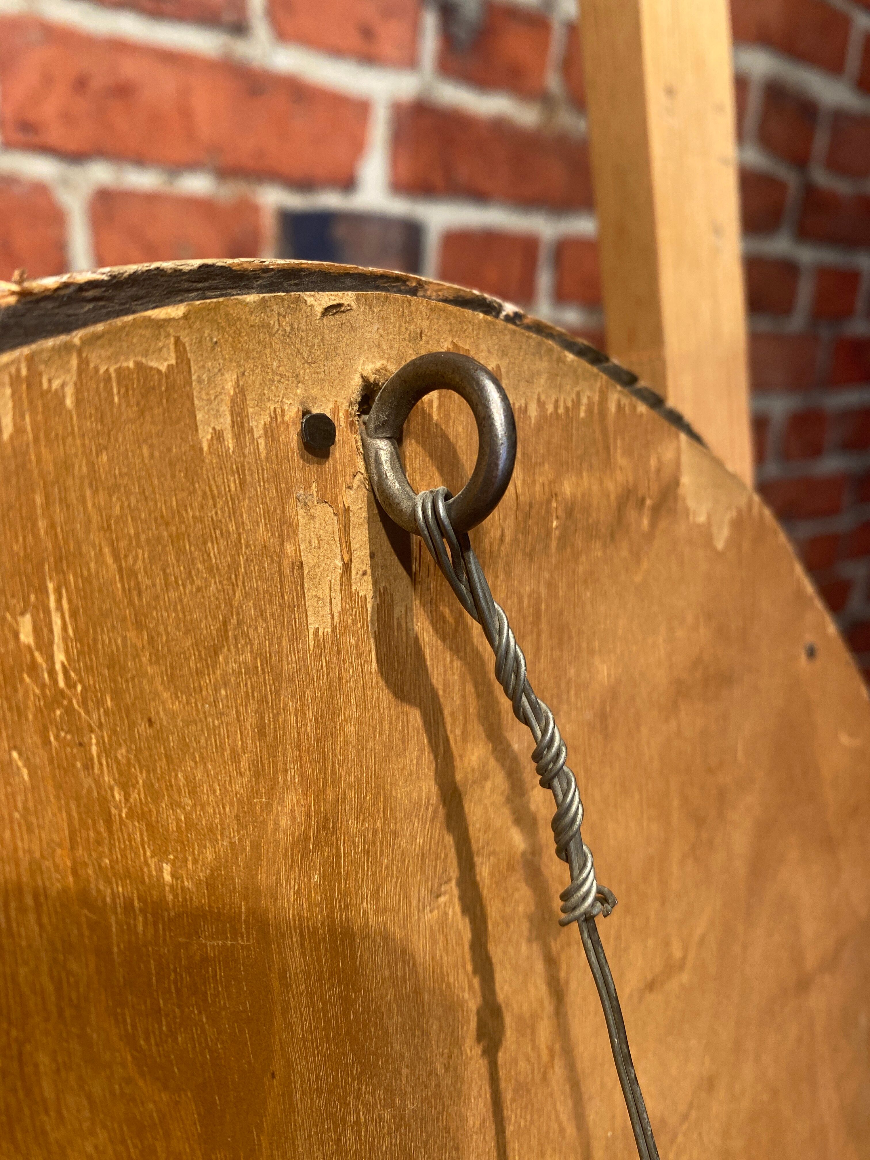 Oval mirror with wooden frame