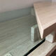 Table basse vintage en travertin et verre