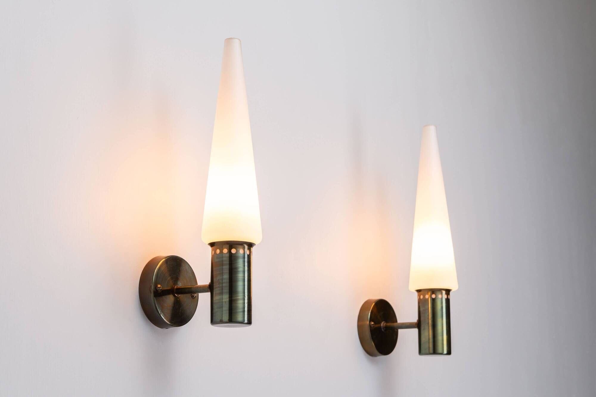 Set of two Hans Agne Jakobsson wall lamps with opal glass shades