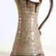 Enamelled stoneware pitcher signed