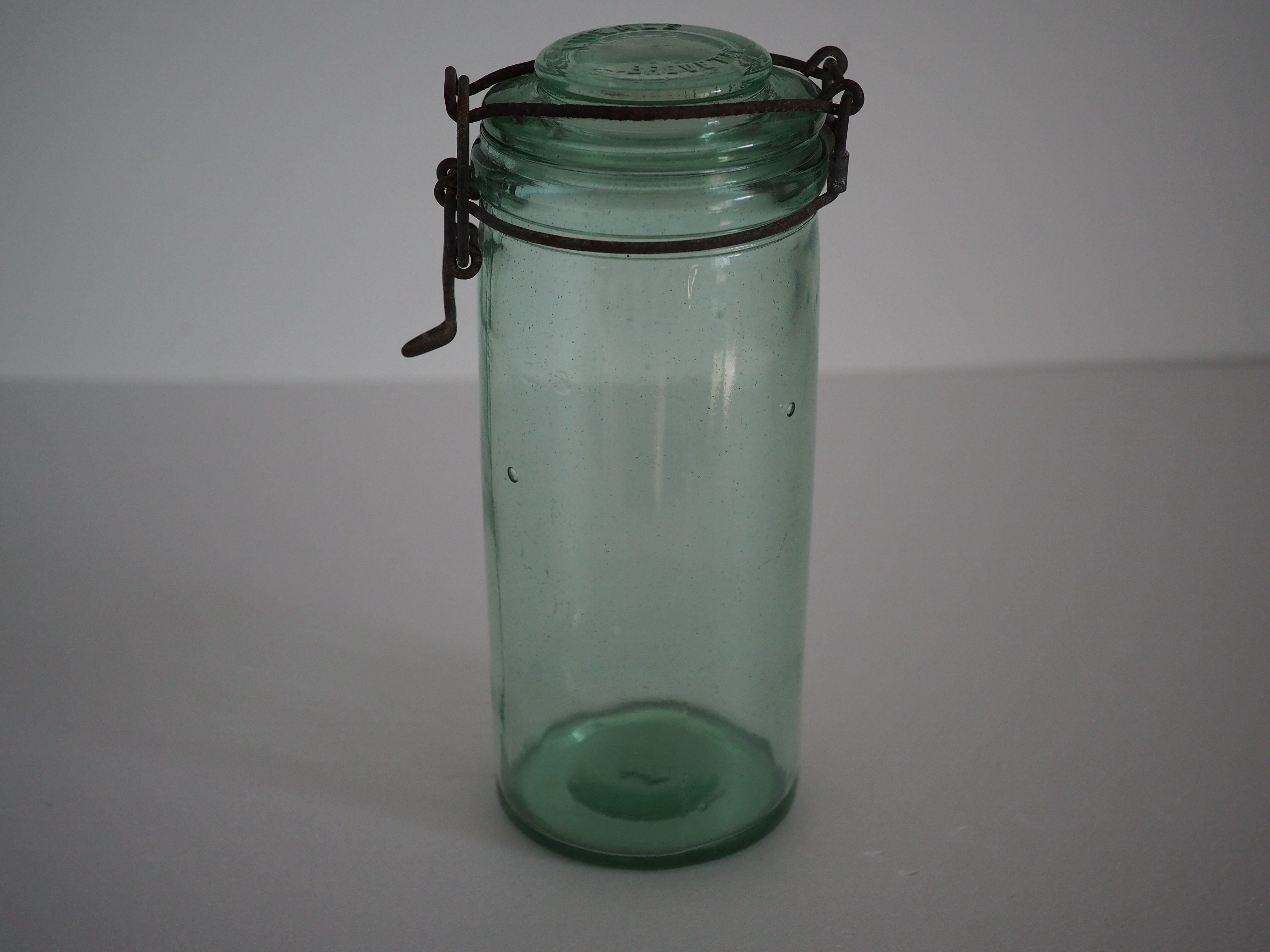 Green "ideale" glass canning jar