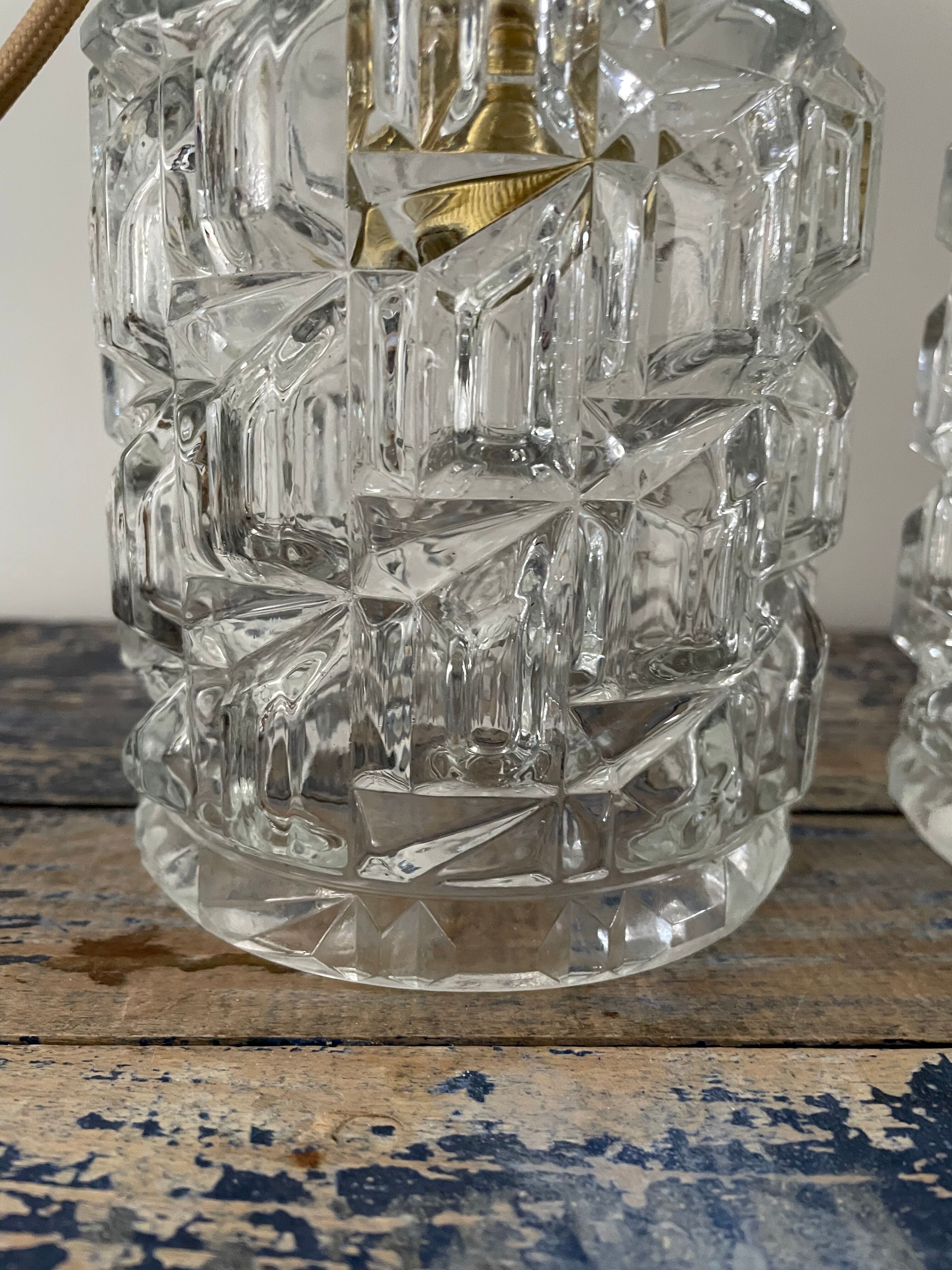 Set of two vintage electric chiseled glass walking lamps