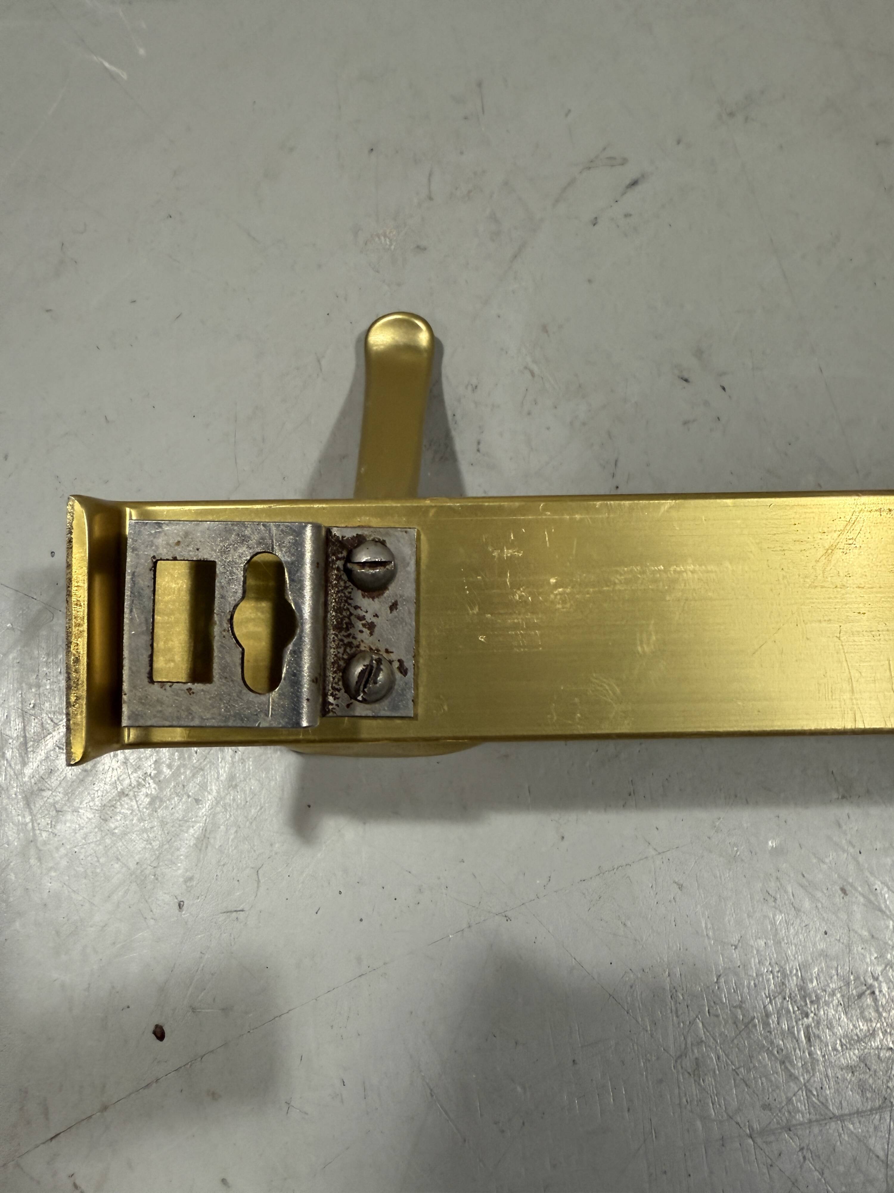 Gold coloured aluminium wall coat racks 1960’s