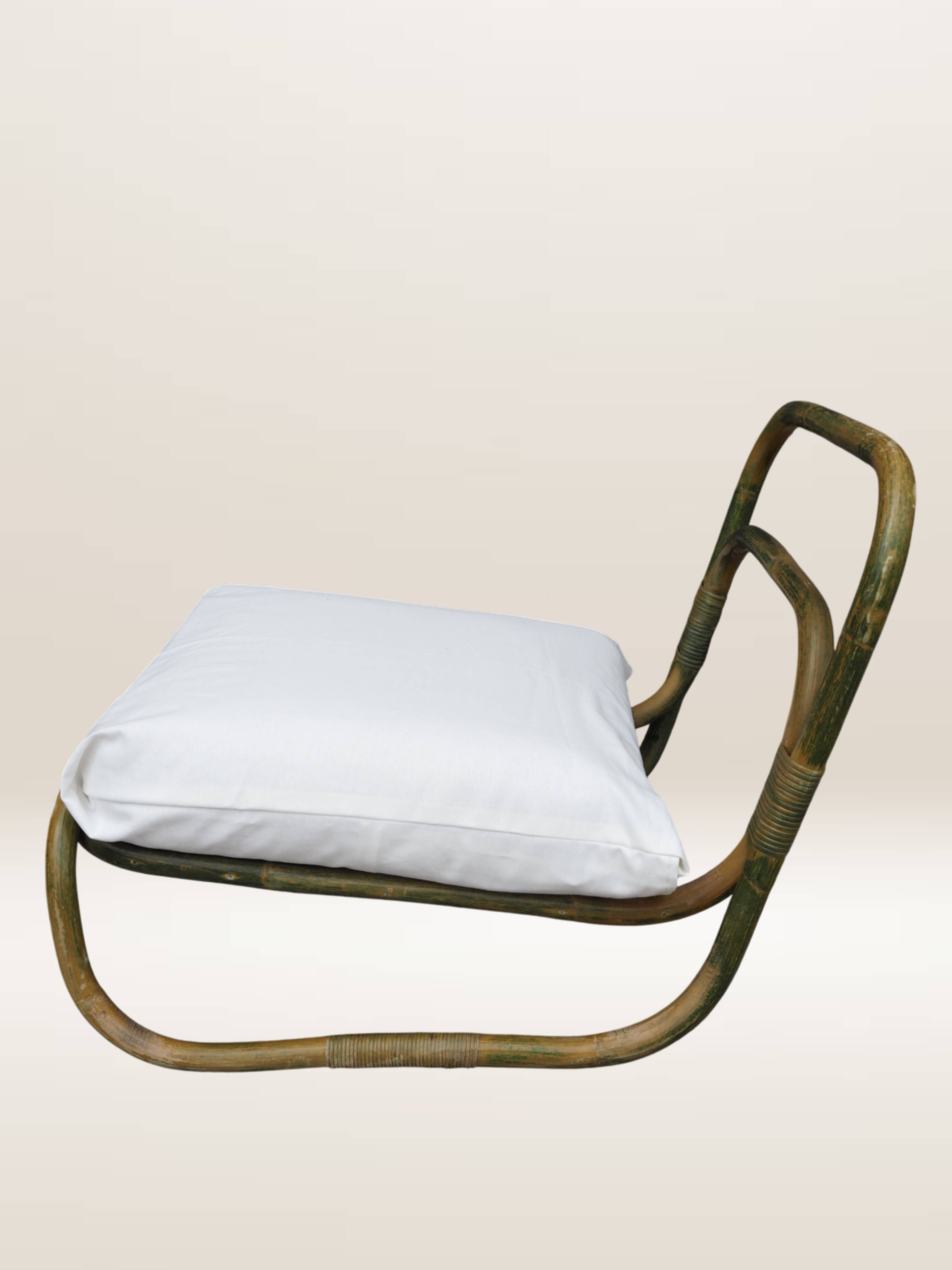 Pair of curved bamboo armchairs