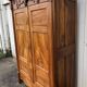 Empire wardrobe in solid walnut, France, mid-19th century.