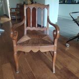 antique cherry and straw armchair with cathedral back