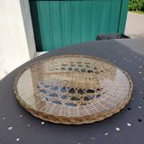 Round tray in woven wicker and glass