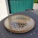Round tray in woven wicker and glass