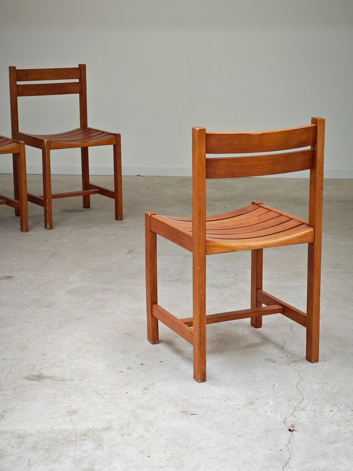 Set of 4 wooden chairs by André Sornay