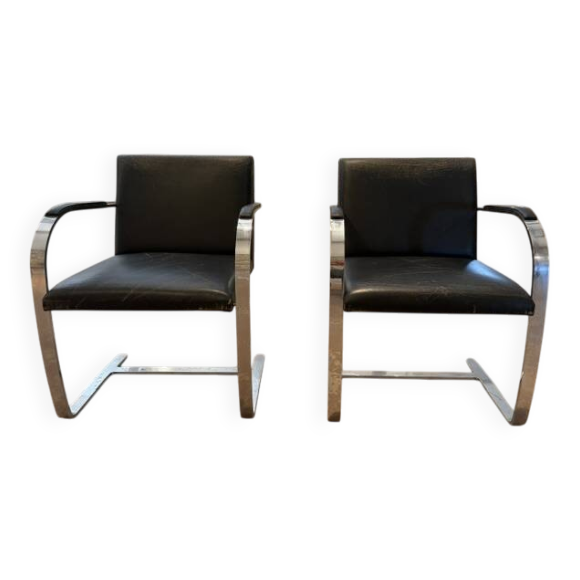 Pair of Executive Chairs by Knoll attributed to Charles Pollock in black leather.