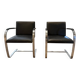 Pair of Executive Chairs by Knoll attributed to Charles Pollock in black leather.
