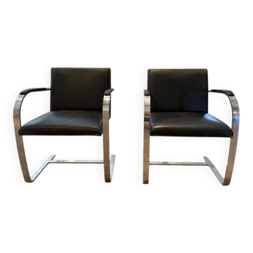 Pair of Executive Chairs by Knoll attributed to Charles Pollock in black leather.