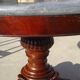 Empire guéridon in mahogany and marble, revolving top.
