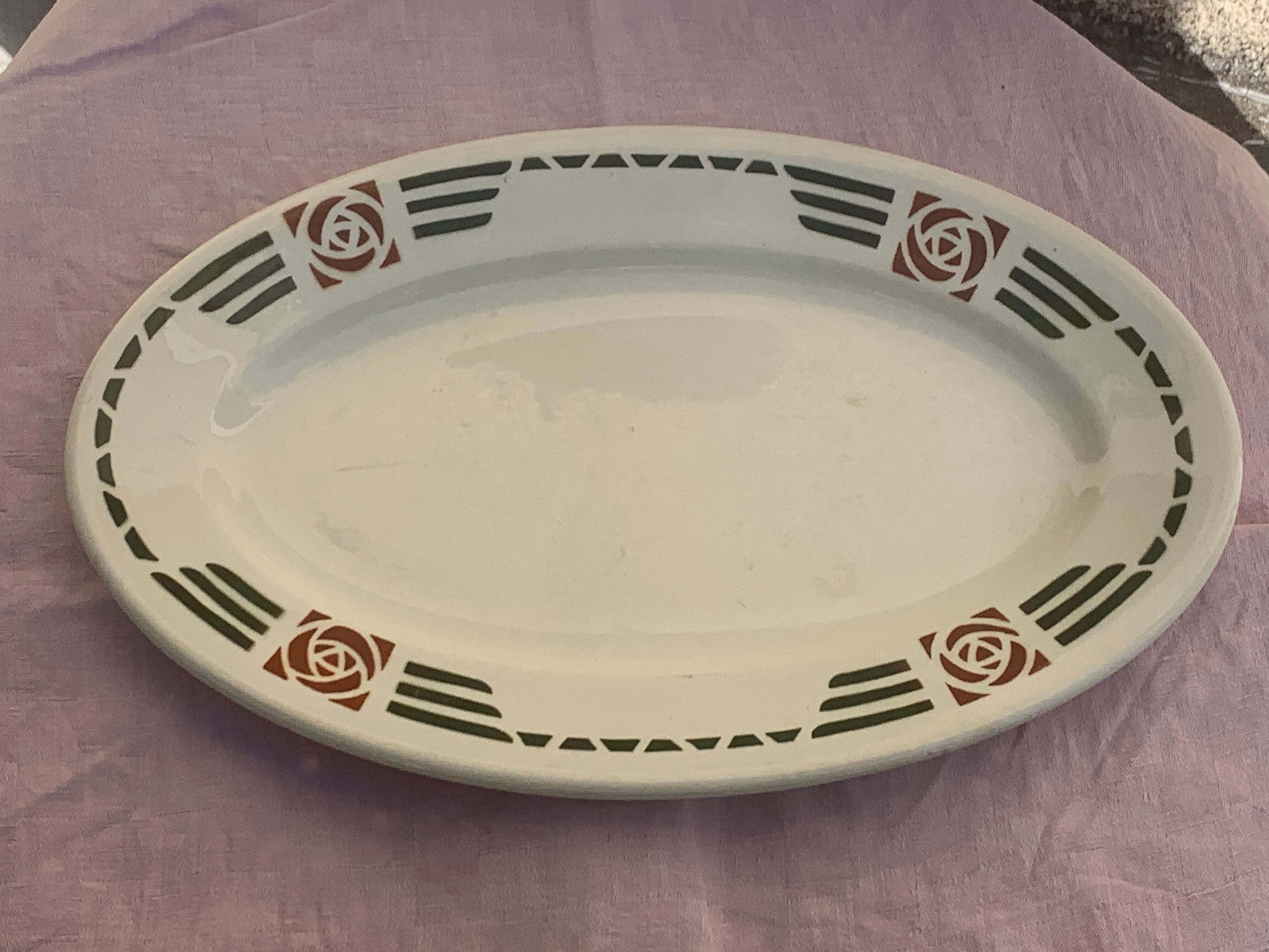 Serving dish in charcoal earthenware model Courbet art deco