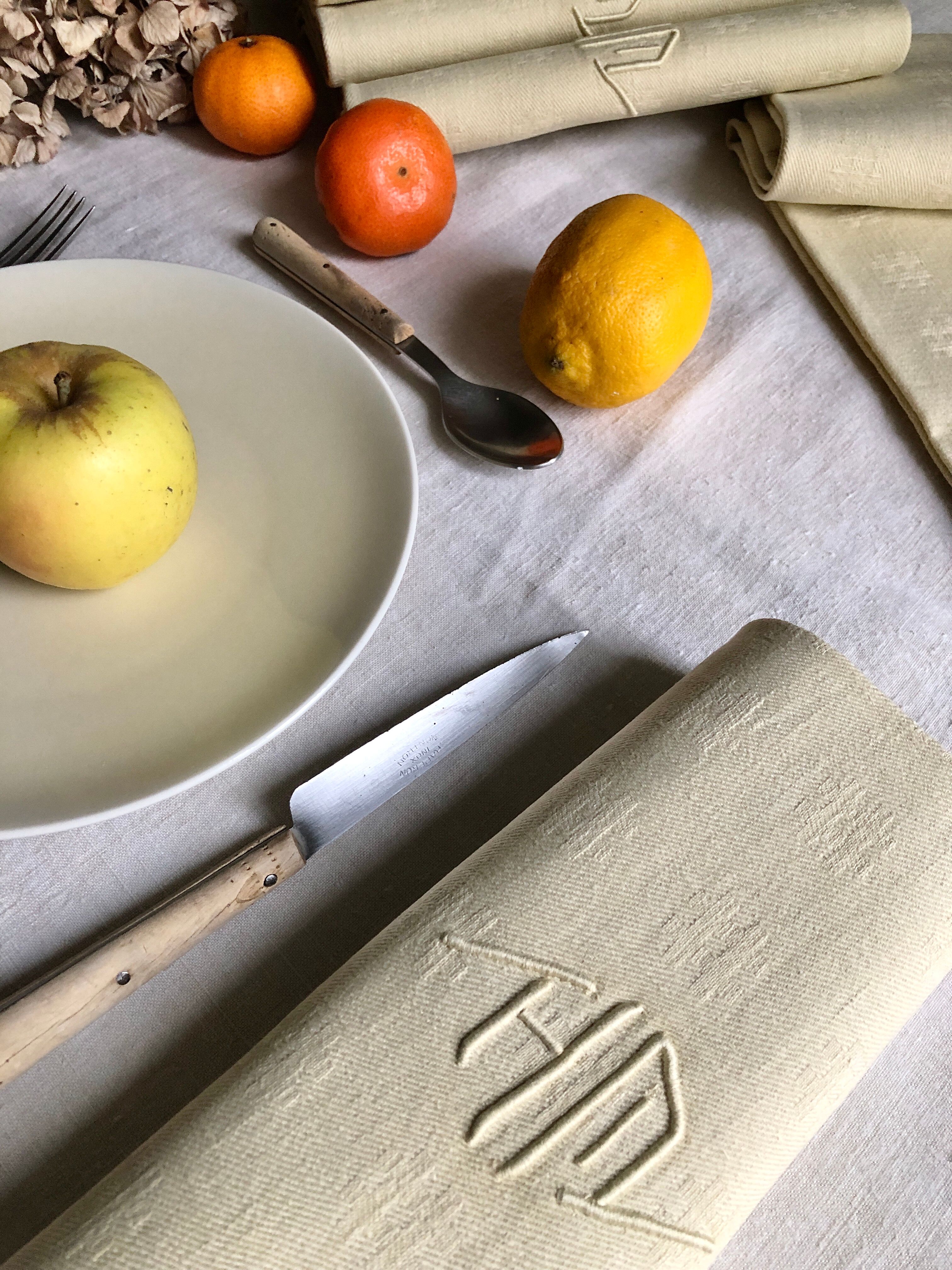 Antique napkins damascus and monogrammed tinted fresh butter