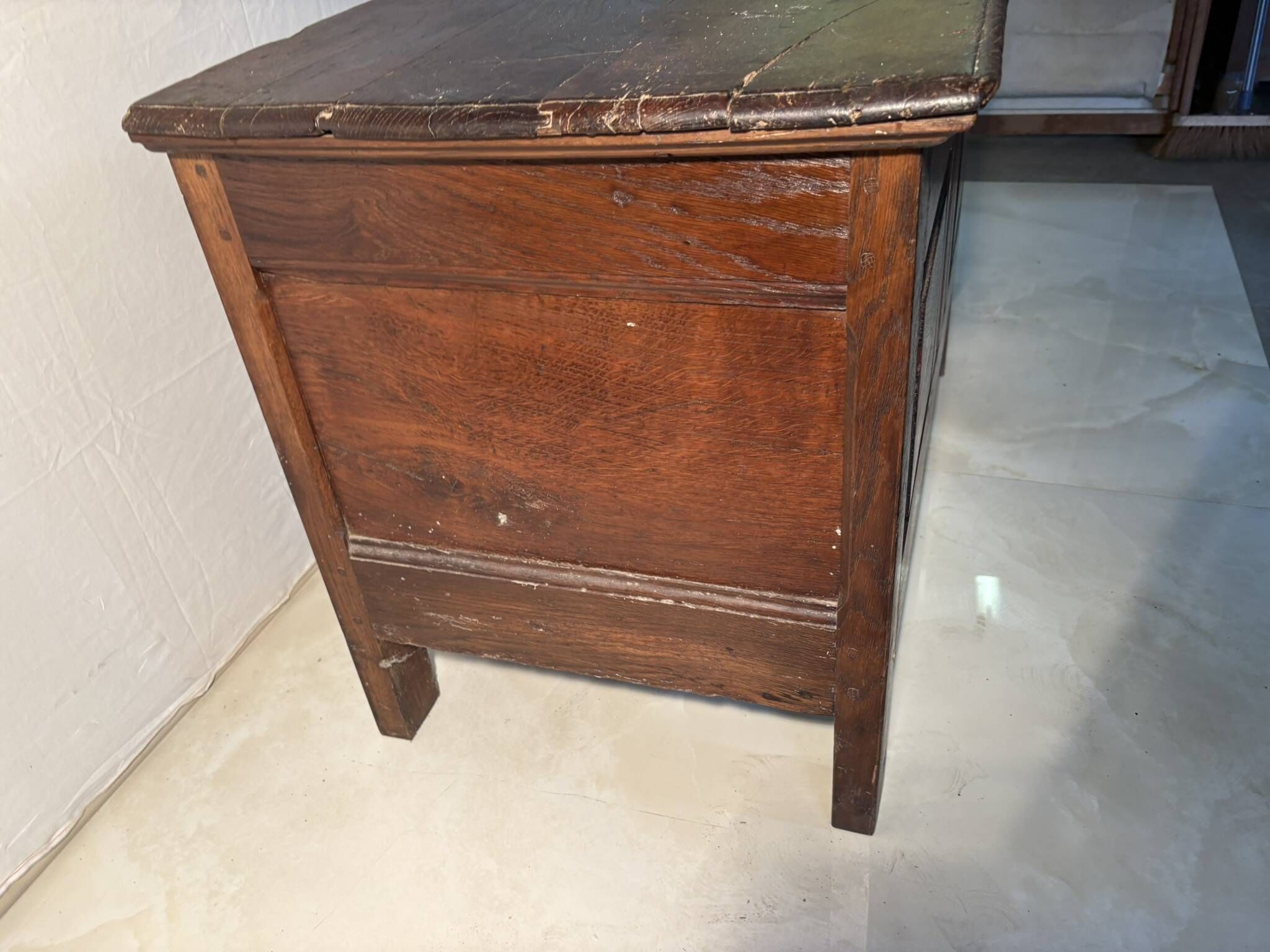 Rustic antique oak chest, original fittings and moulded panels.