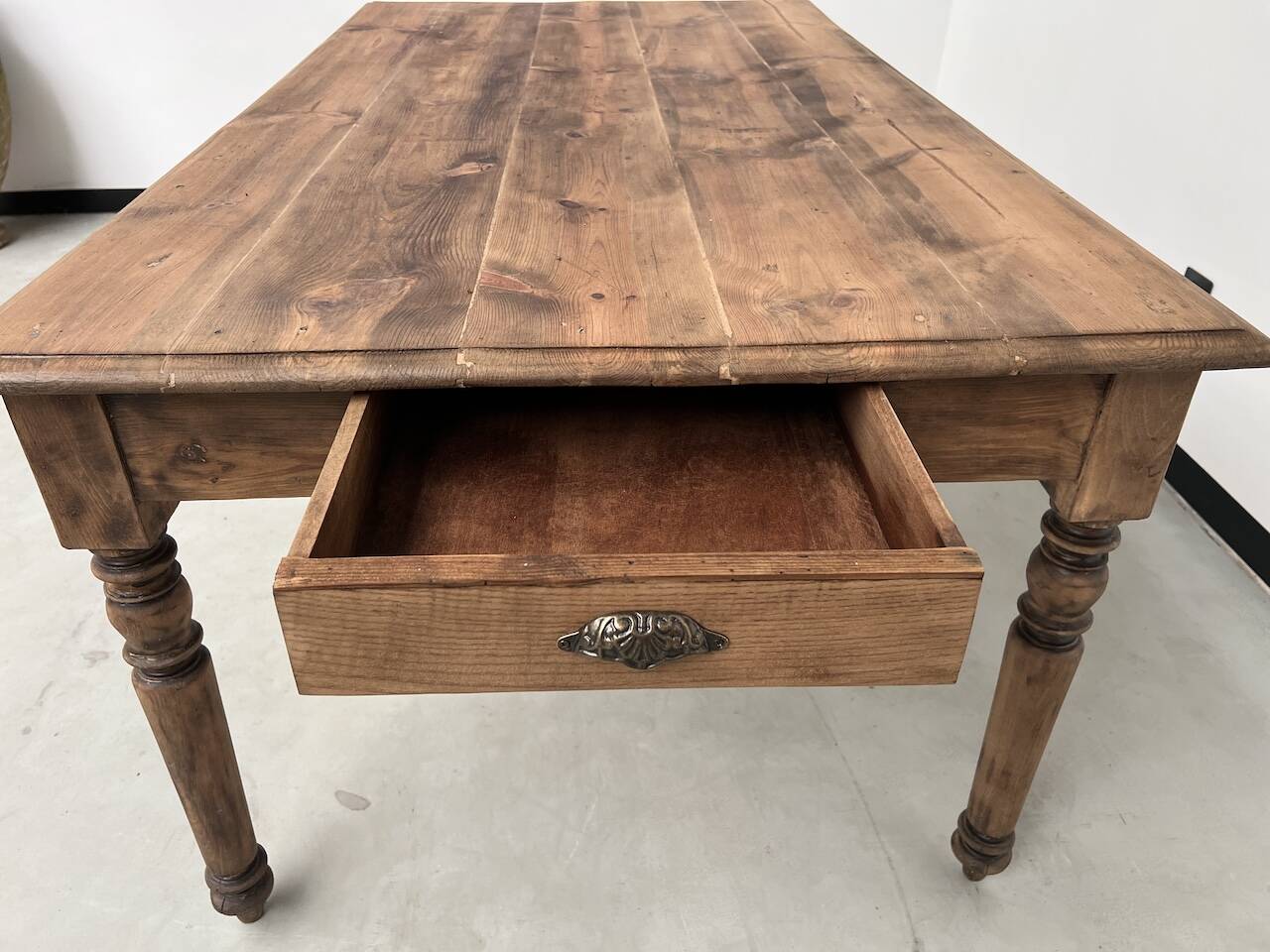 Antique farm table from the 1950s, with 3 drawers and turned legs