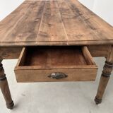 Antique farm table from the 1950s, with 3 drawers and turned legs
