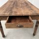 Antique farm table from the 1950s, with 3 drawers and turned legs