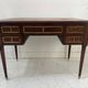 Louis XVI style desk in mahogany and mahogany veneer, 20th century.