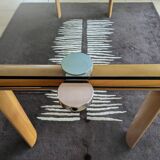 Tempered glass table + adjustable extensions Cinna model from the Roset line