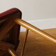 Chaise en skai rouge, pieds compas, années 60