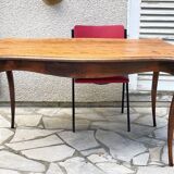 Solid wood table with curved legs
