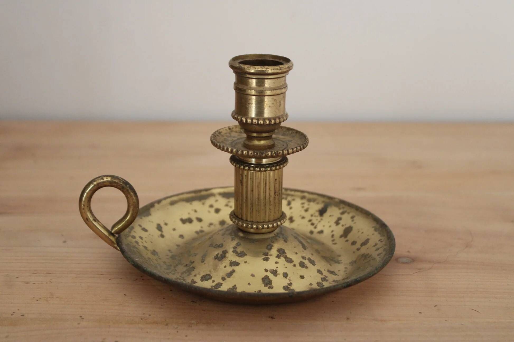 Antique brass hand candlestick – Columned fluted cellar rat