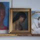 Old oil portrait of a woman on panel