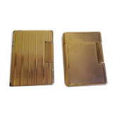 2 st dupont lighters, gold plated, punches, numbered, 1 striated pattern, 1 hammered pattern, 70s