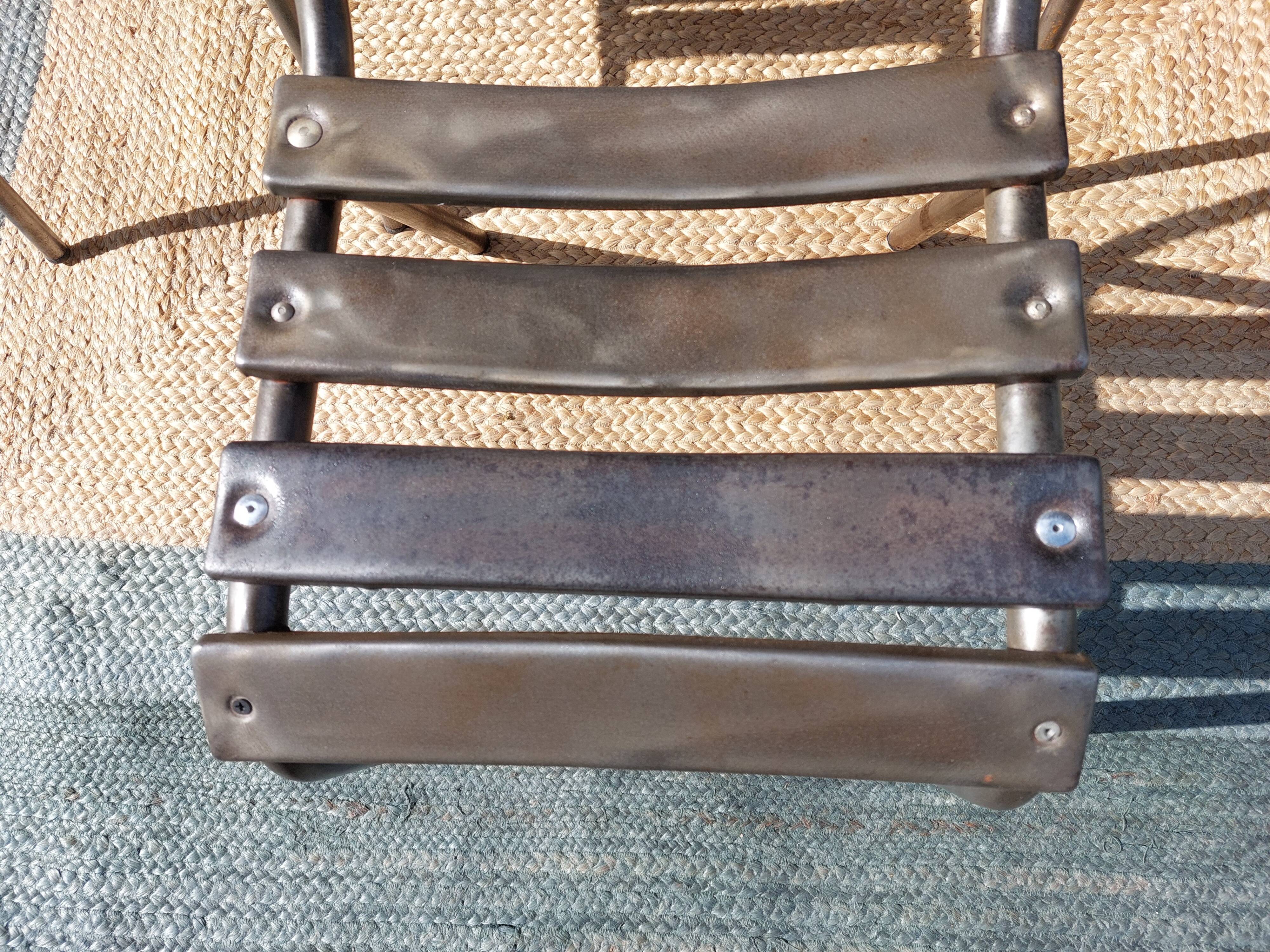 3 metal chairs, Tolix style