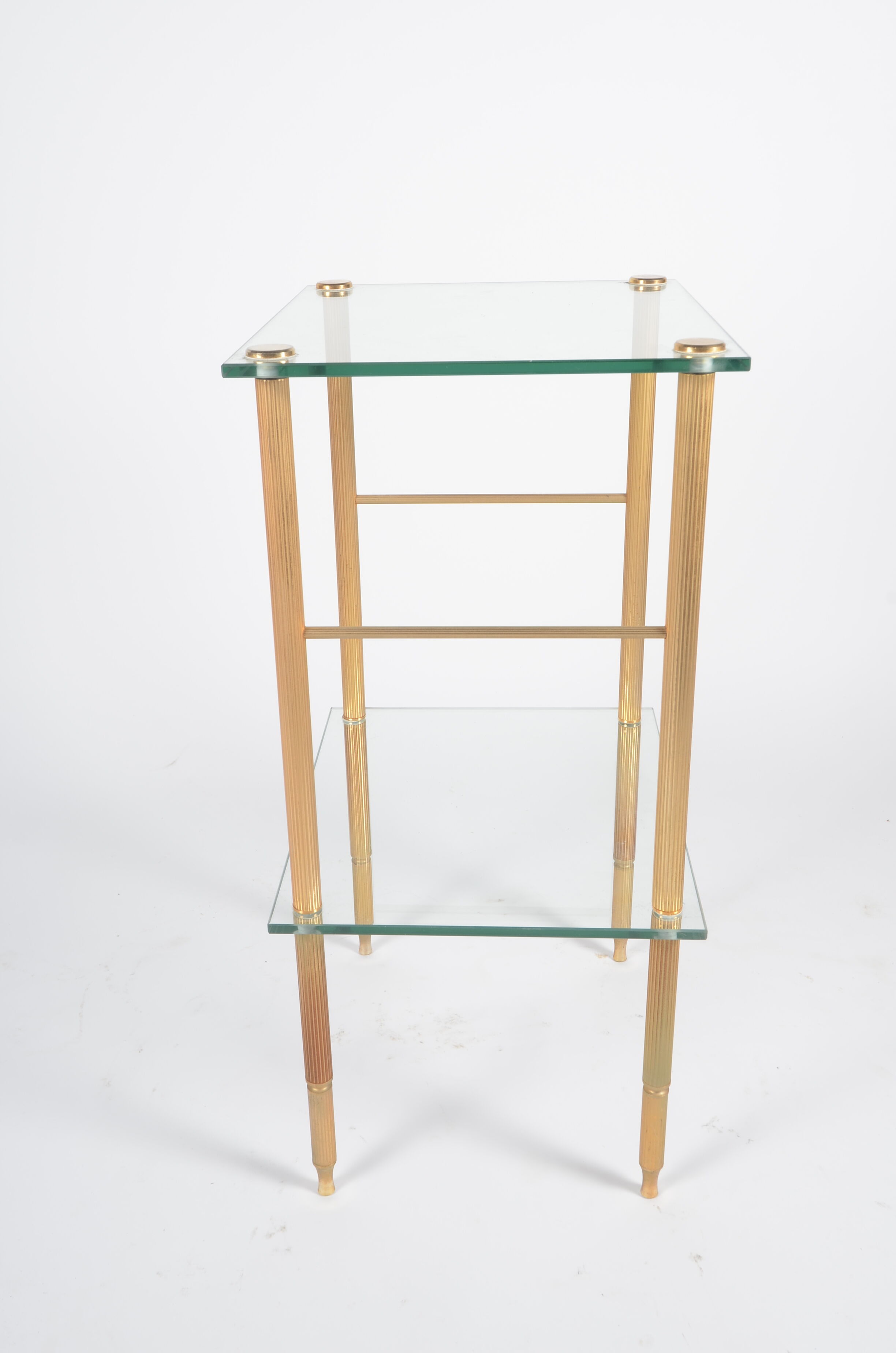 Glass and golden brass side table
