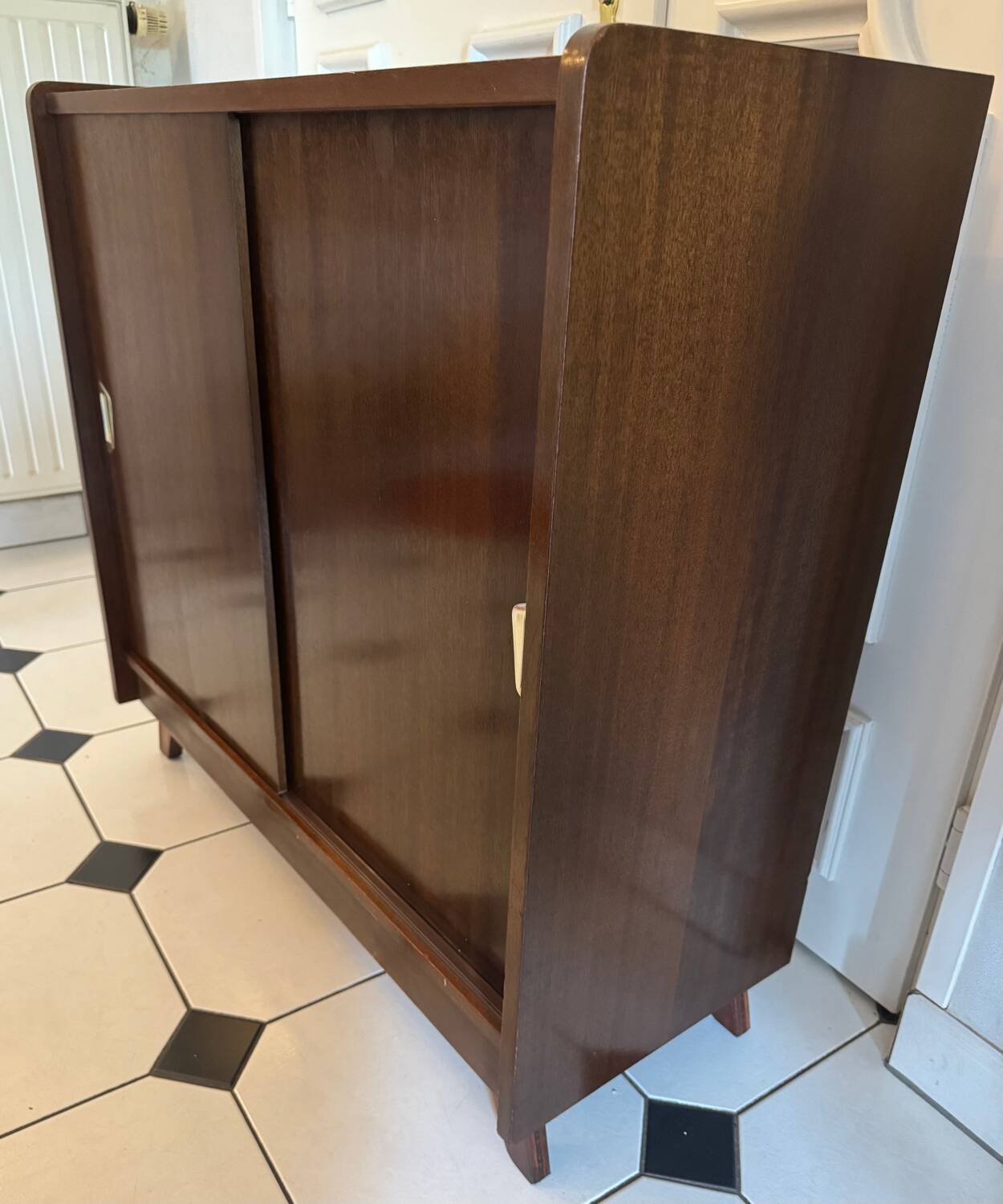 Vintage shoe cabinet with compass legs