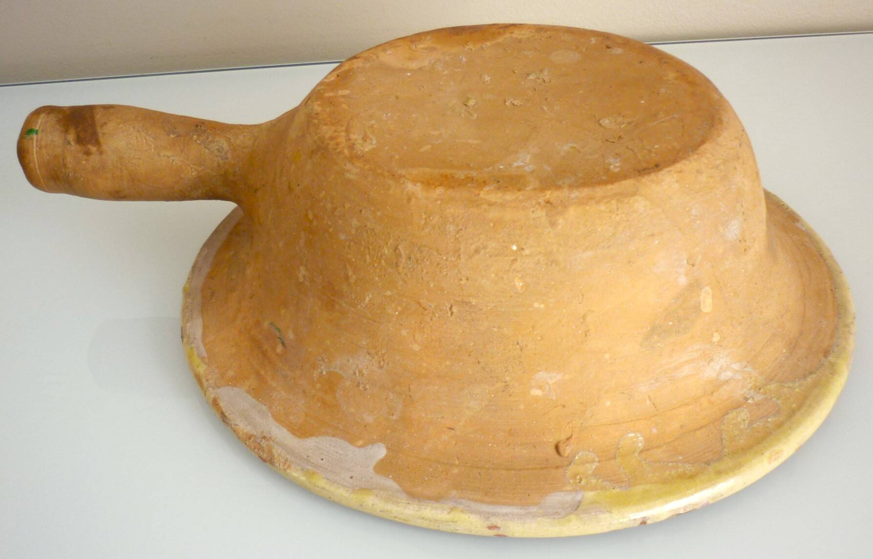 Frying pan, old caquelon, yellow glazed earthenware from the south of France.