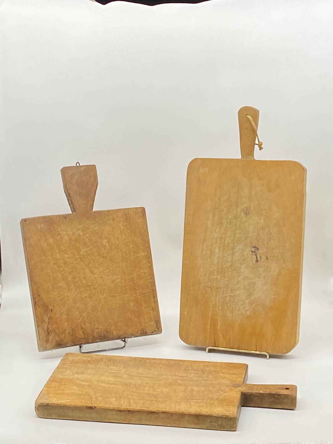 Trio of old cutting boards, butcher block,