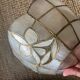 Pair of vintage wall lights in mother-of-pearl and gilded brass.