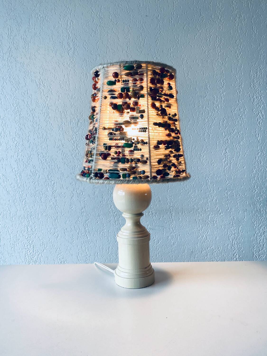 Lamp in turned wood and beads