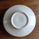 Antique handheld candle holder in porcelain