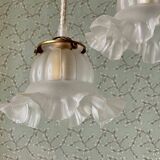 Two vintage tulip pendant lights in molded glass