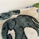 Coussin Ikat en velours éléphants persans
