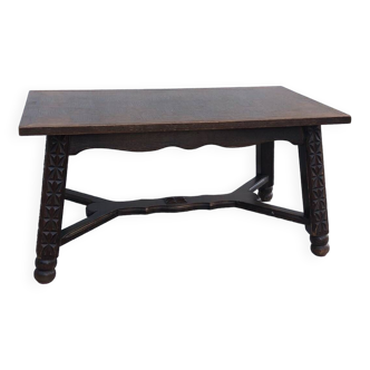 Very beautiful solid wood coffee table with pretty sculpture