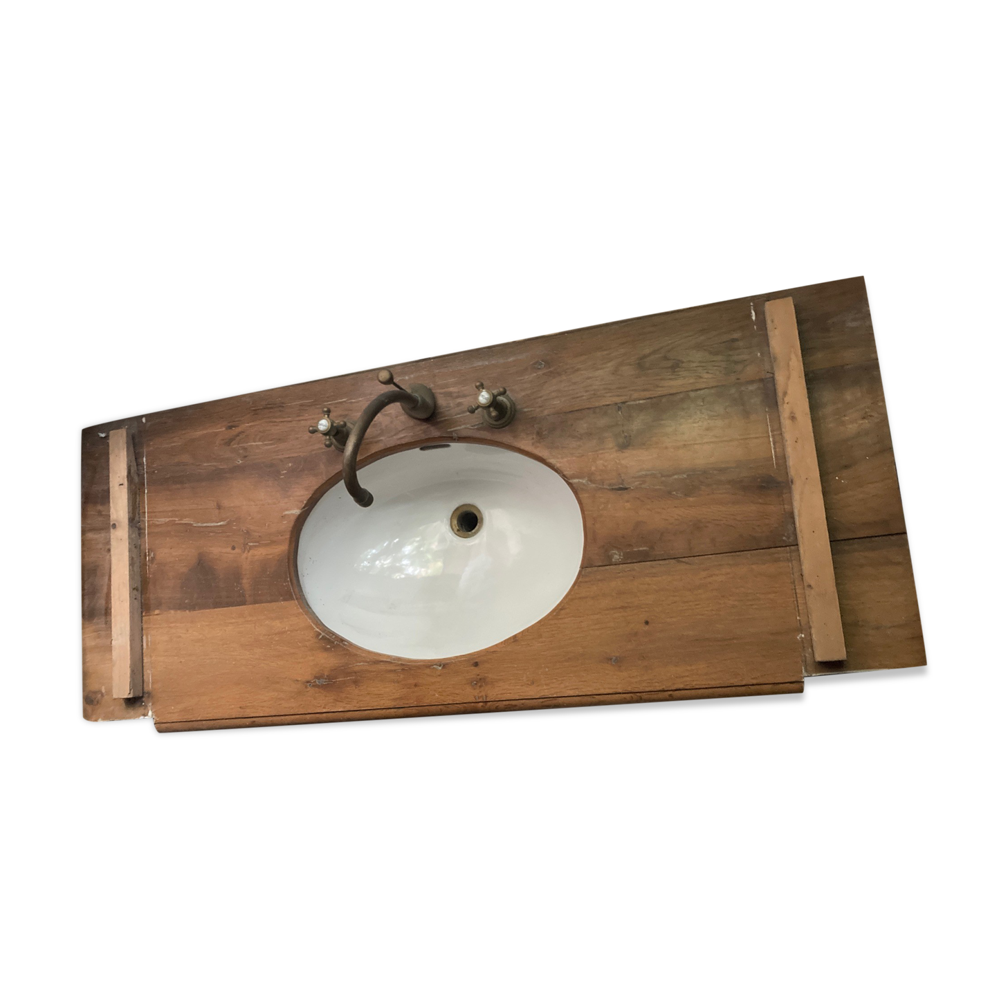 Washbasin recessed in old wood
