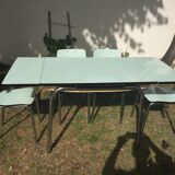 Table and 4 green water formica chairs 60's