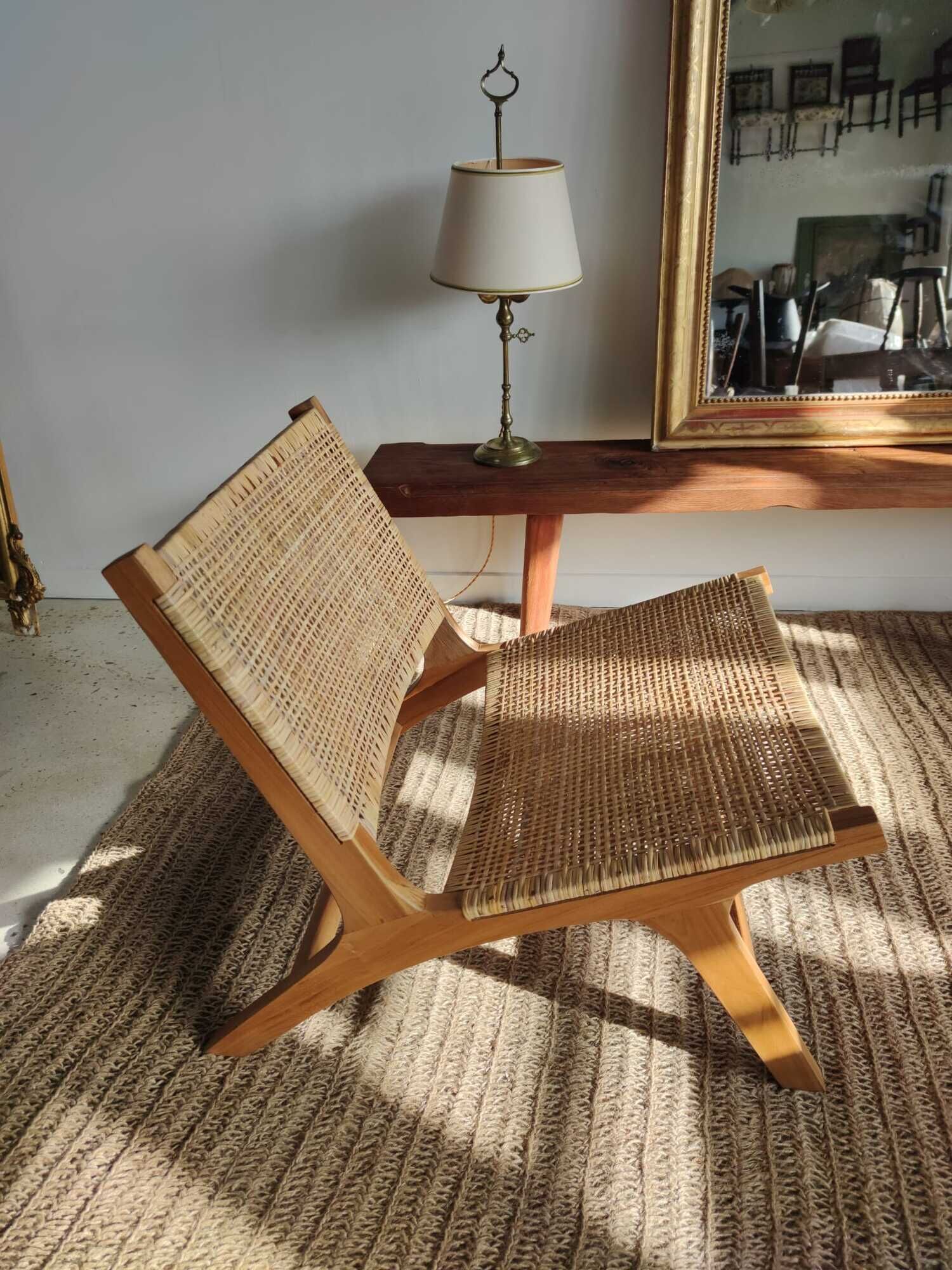 Reclining armchair in natural wood and woven rattan