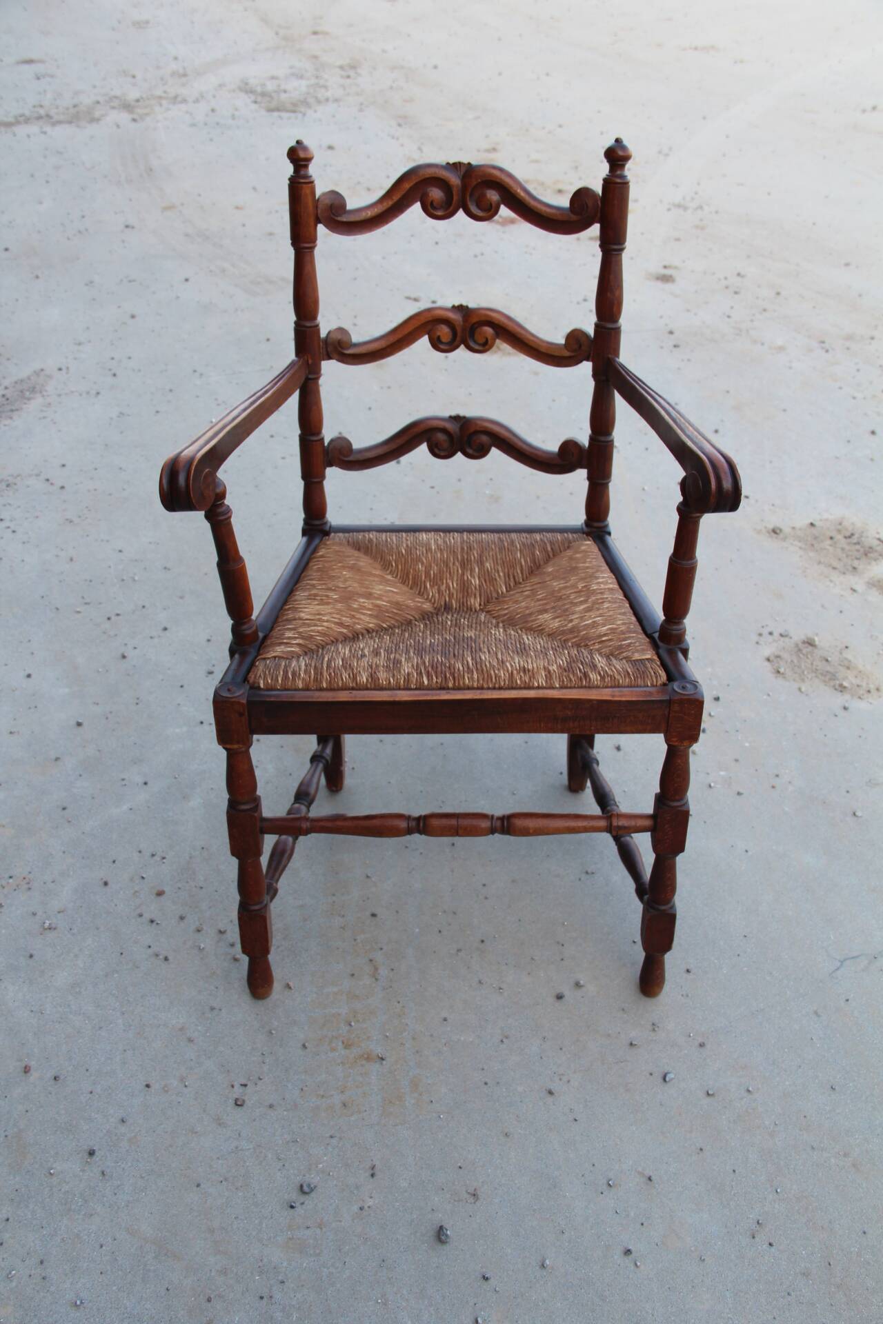 Straw-lined arm chair