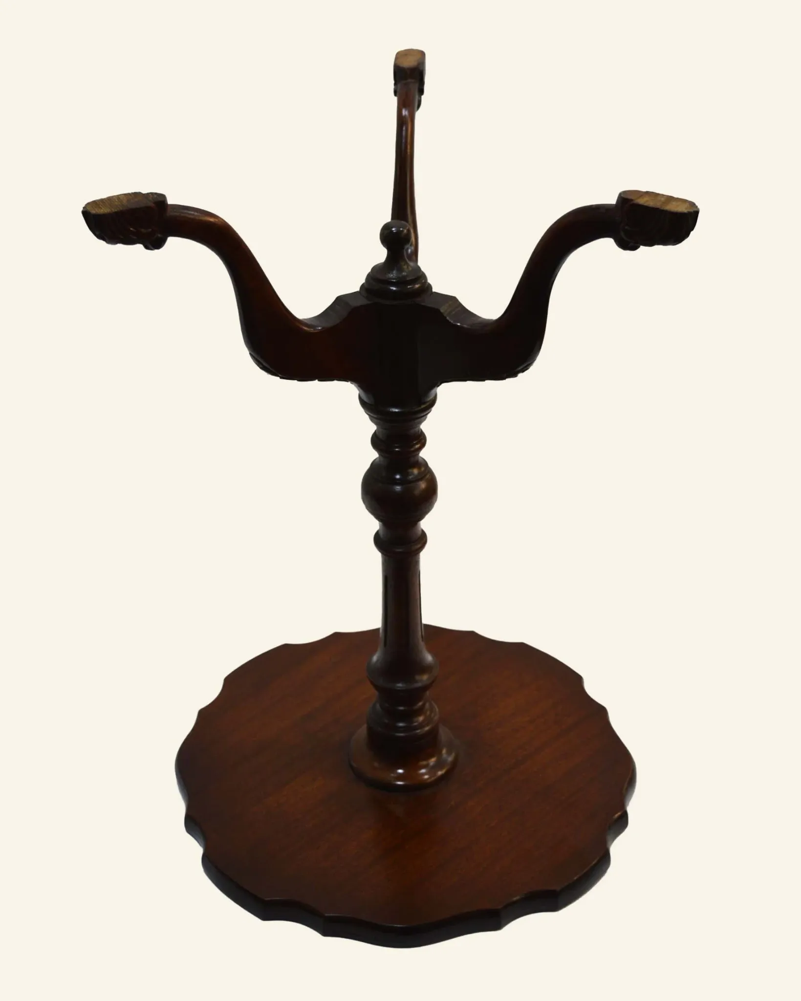 African mahogany guéridon, turned with a sculpted tripod leg.